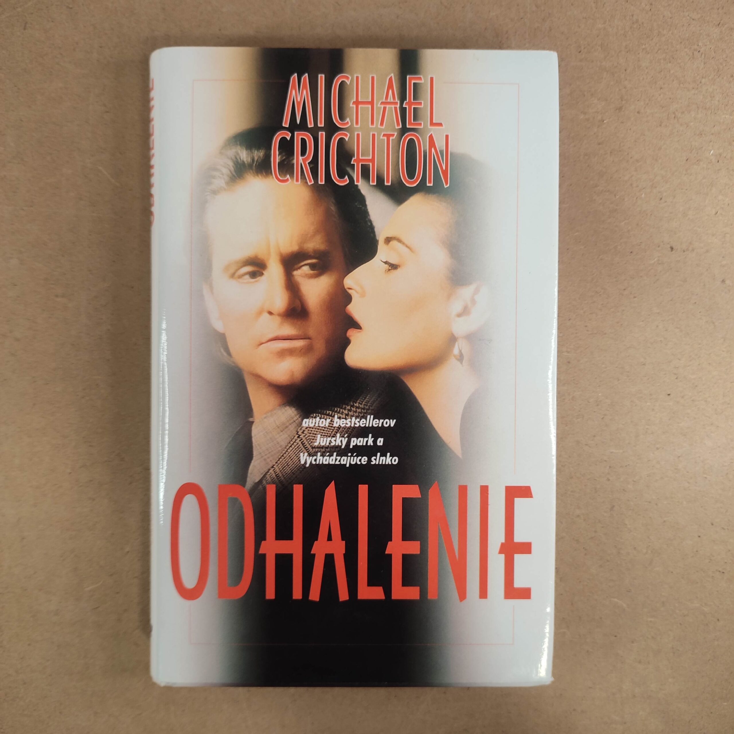 Odhalenie - Michael Crichton